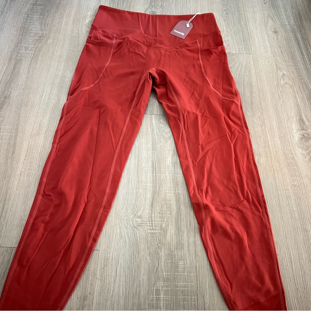 Cosmolle burnt red/orange leggings never worn